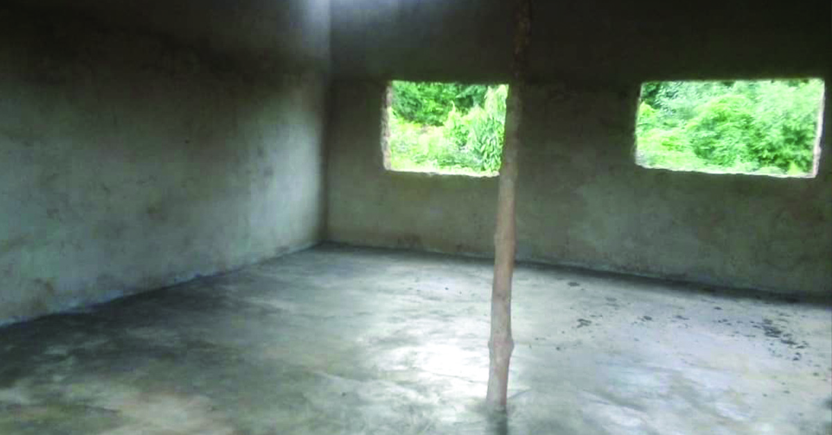 A classroom being build with plastered walls