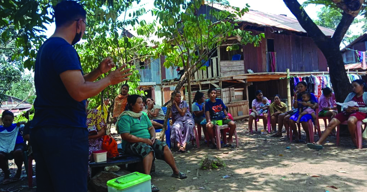 TCD speaker, Ronny speaking at a TCD meeting to the villagers.