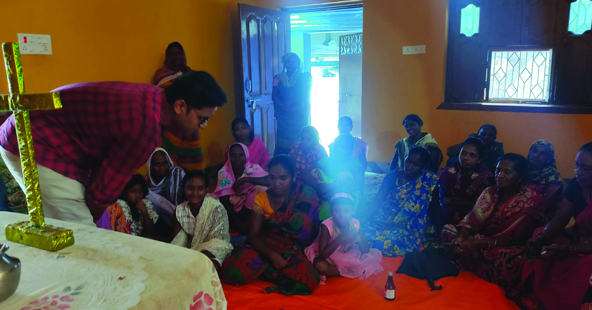 The TCD workers teaching a group of villagers