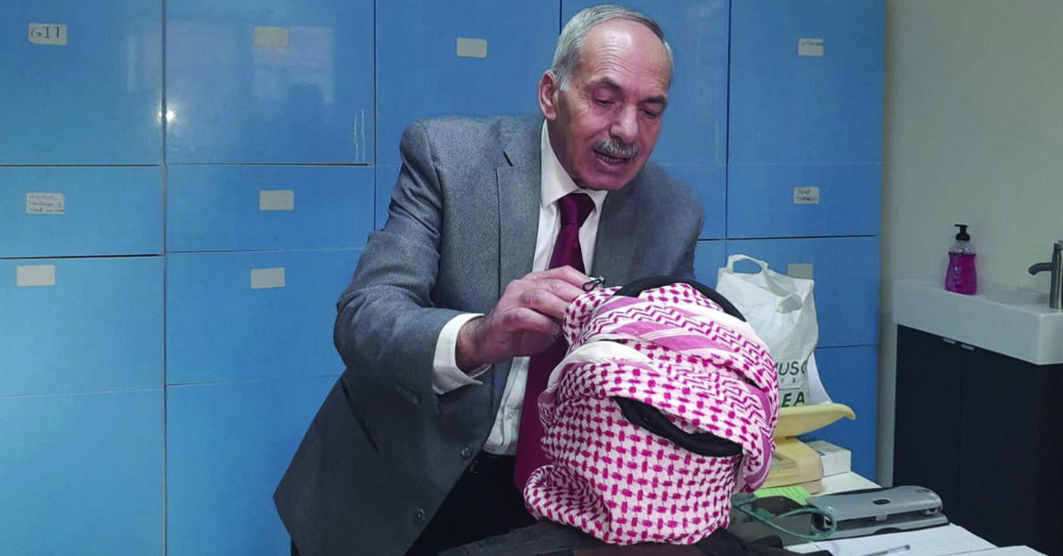 A Jordan doctor doing a medical test on a patient.