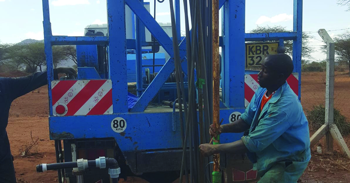 A village using a water machine.