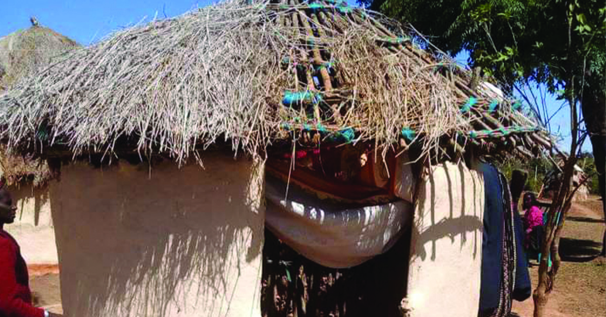 A bathroom hut made by the villagers.