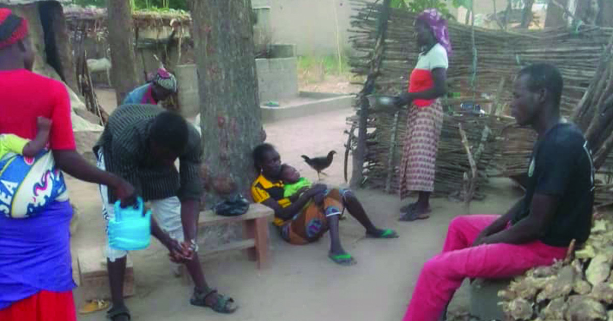 a Ngassa villager washing his hands.