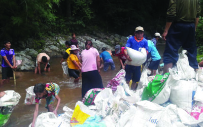 Motivated Villagers Work to Fix Their Road