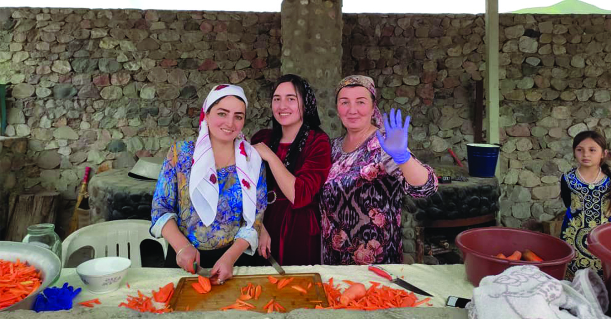 TCD member, Oleg, with Tajikistan women, Lola and Kurbon.