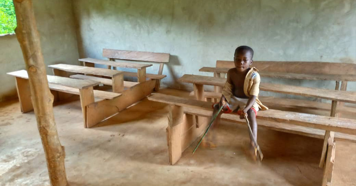 One student showcasing the newly-built classroom.