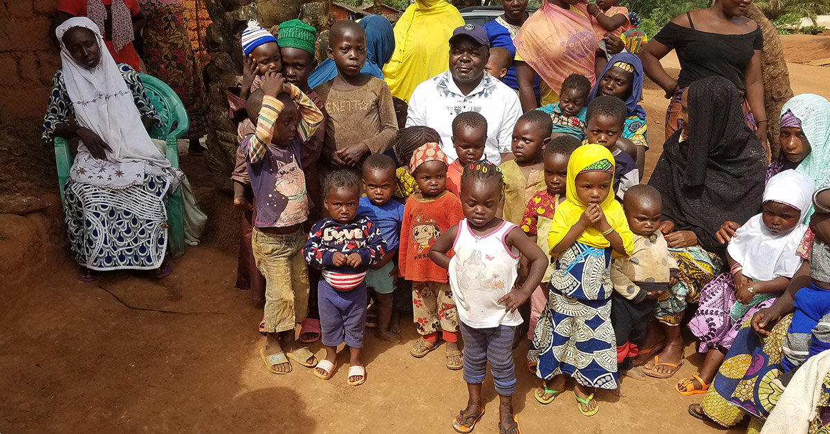 A group of Cameroon children and their parents.