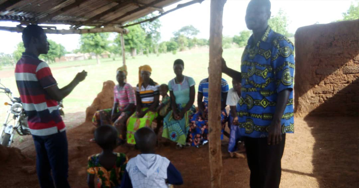 A group of Togo villagers attending a financial literacy class.