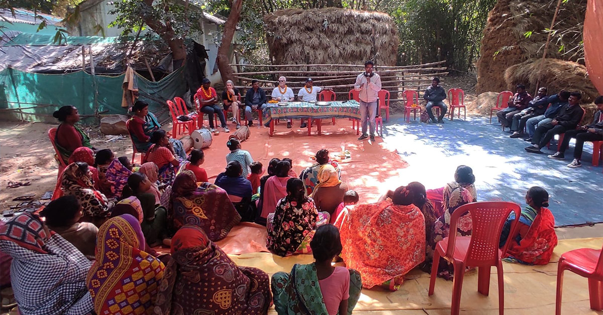 A large group of Shri Ambra villagers listening to a TCD lesson.