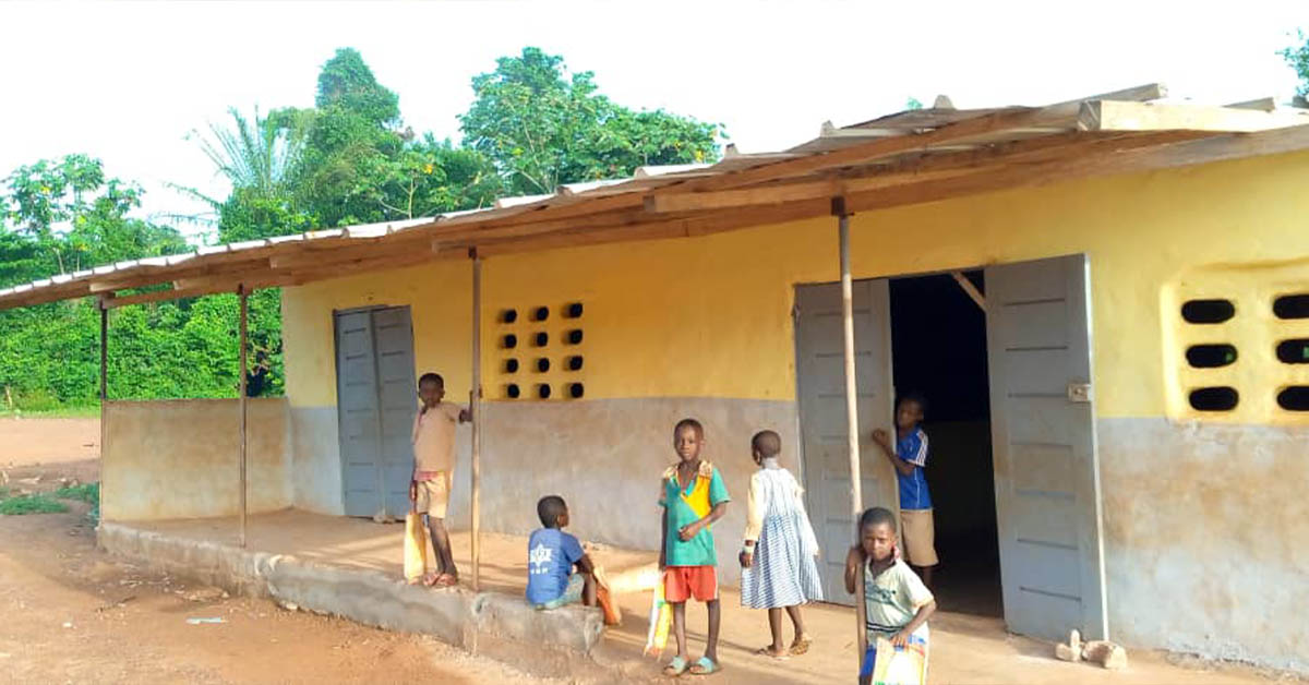 A yellow-painted school building.