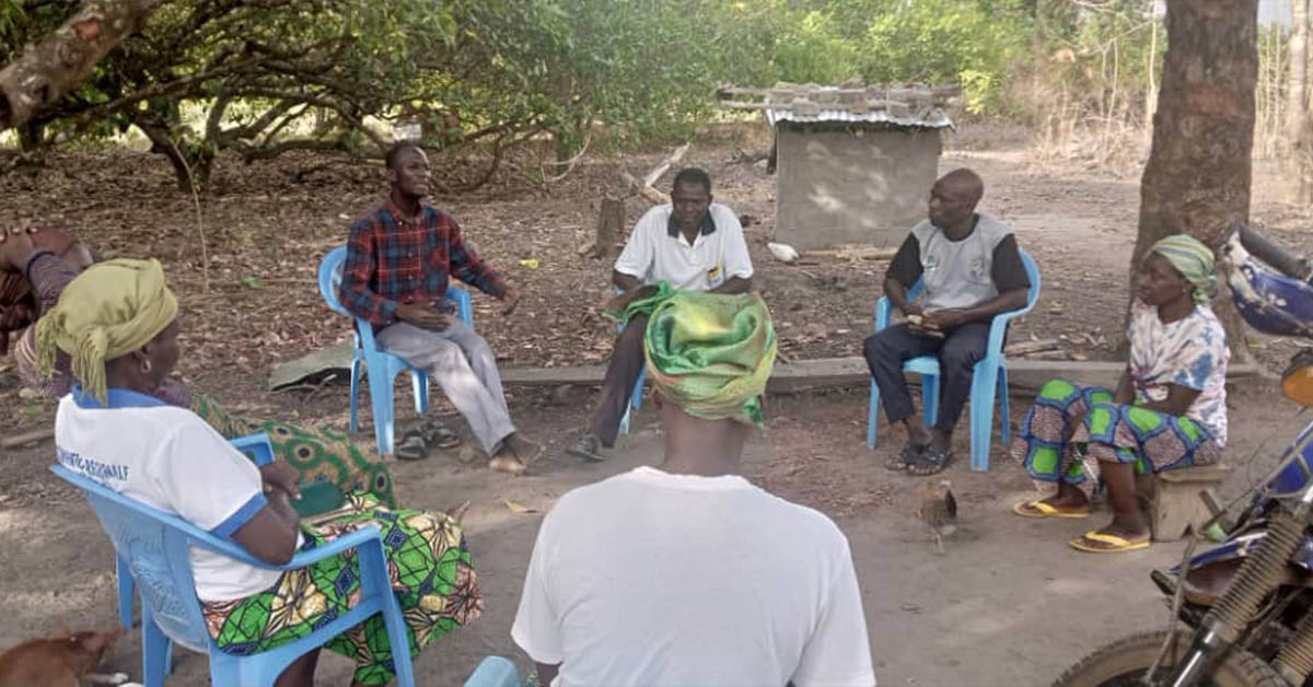 The Agriculture Committee discussing matters in a circle.