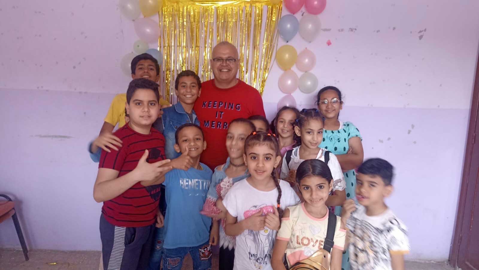 A group photo of the Ezbit el Nakhl children that attend the TCD lessons.