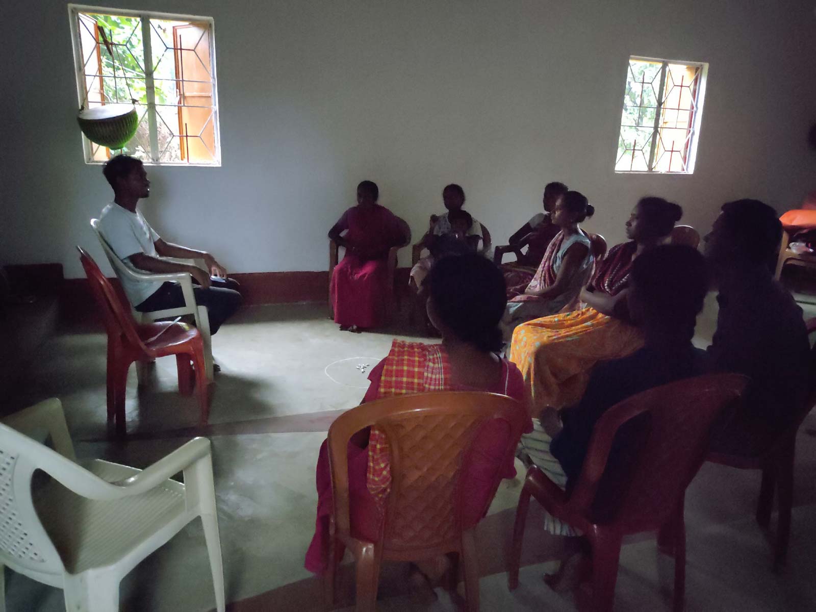 An indoor TCD meeting taking place.