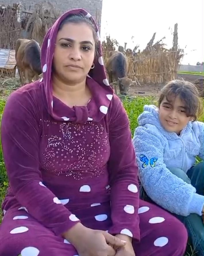 A casual, sit-down photo of Afaf and her daughter.