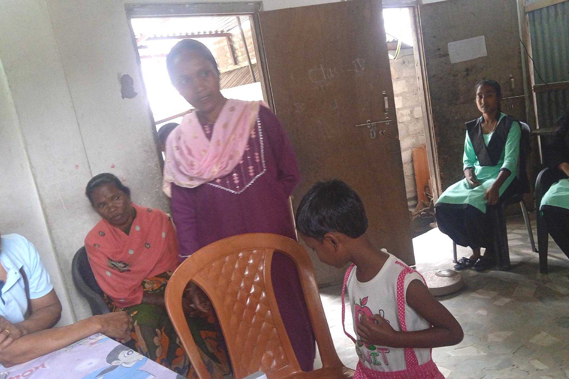 A TCD meeting taking place indoors at the Tea Garden Cluster.