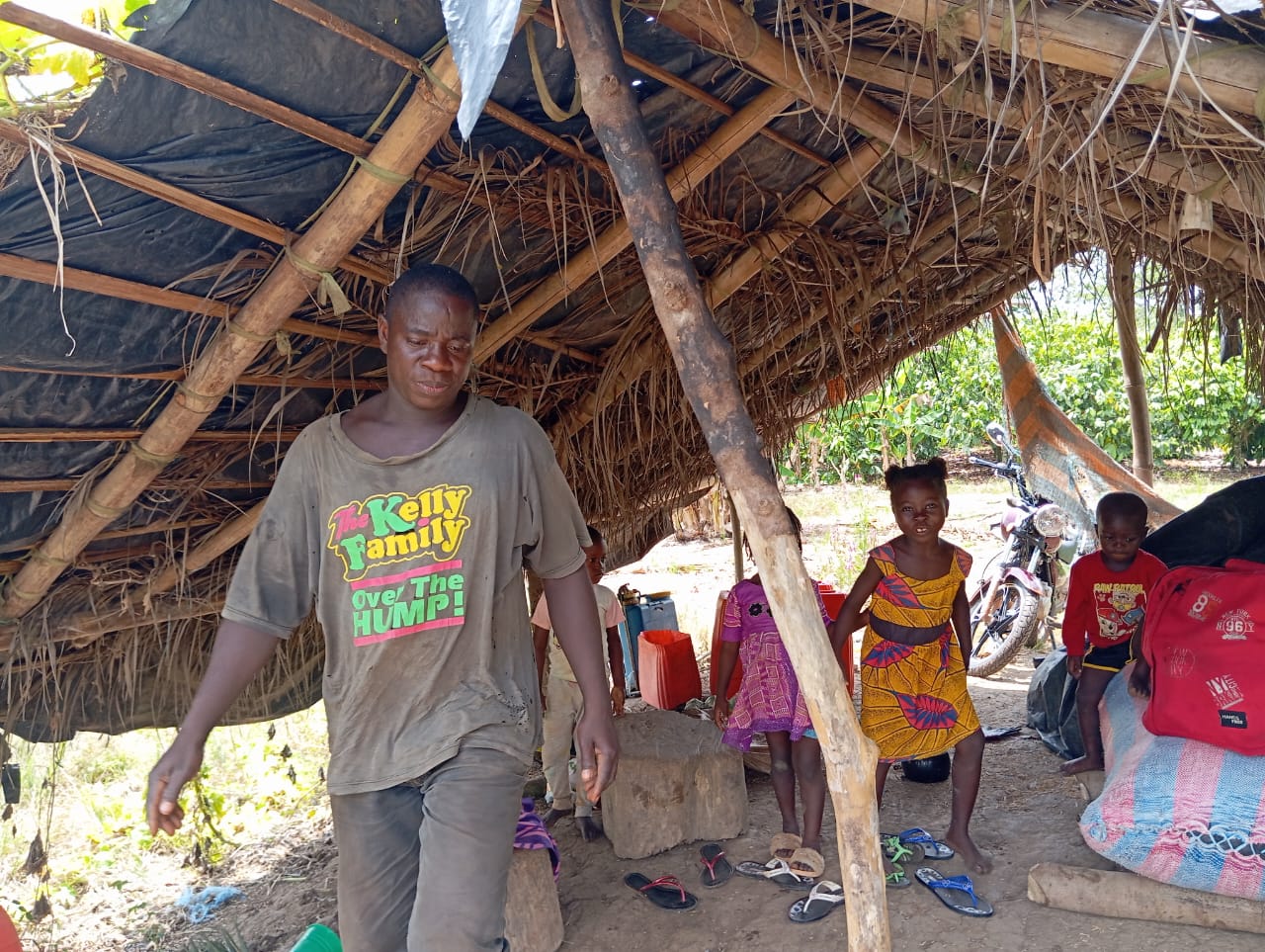 An Attakasikoro family of four under the shade.