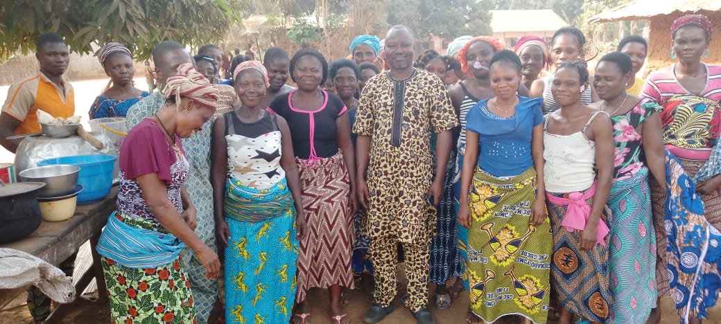 A group of Benin villagers after a committee meeting.