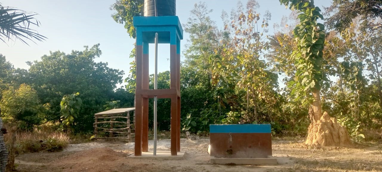 The green & brown borehole at Kouvome Village.