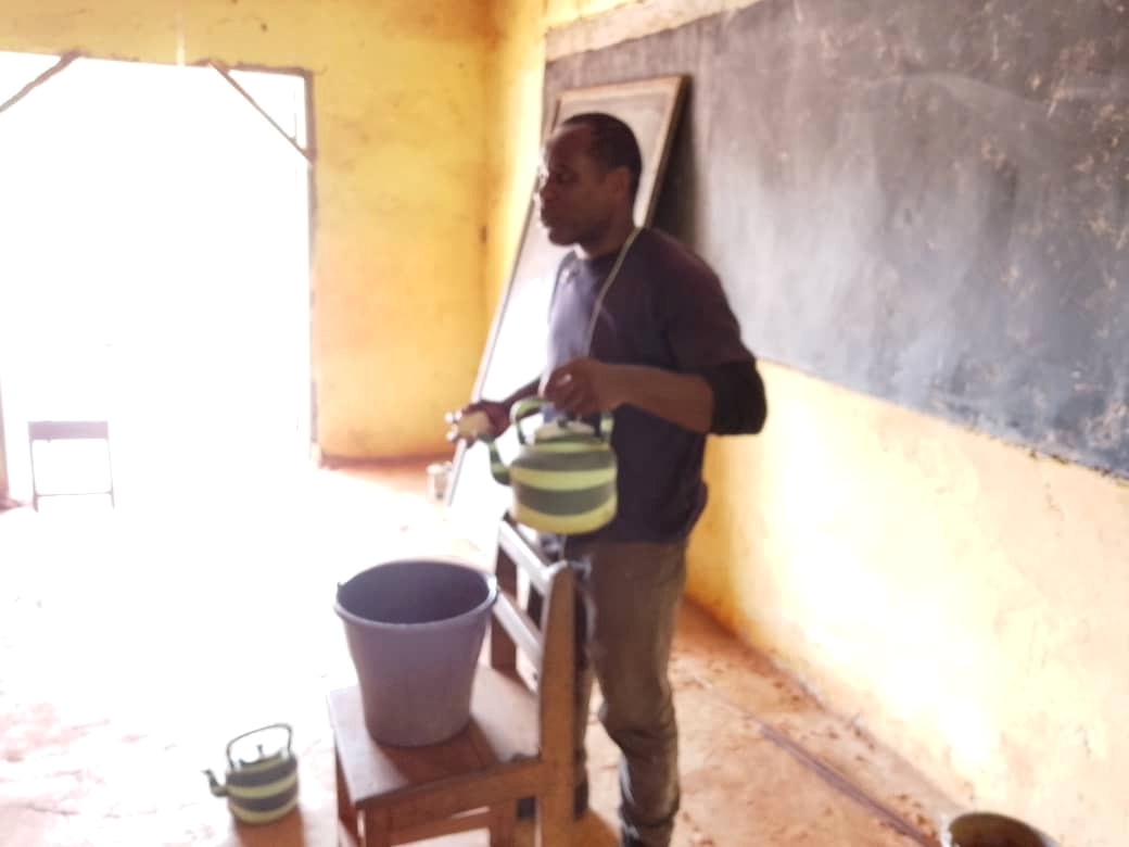 A wellness lesson being taught in the classroom at Effaoho Village.