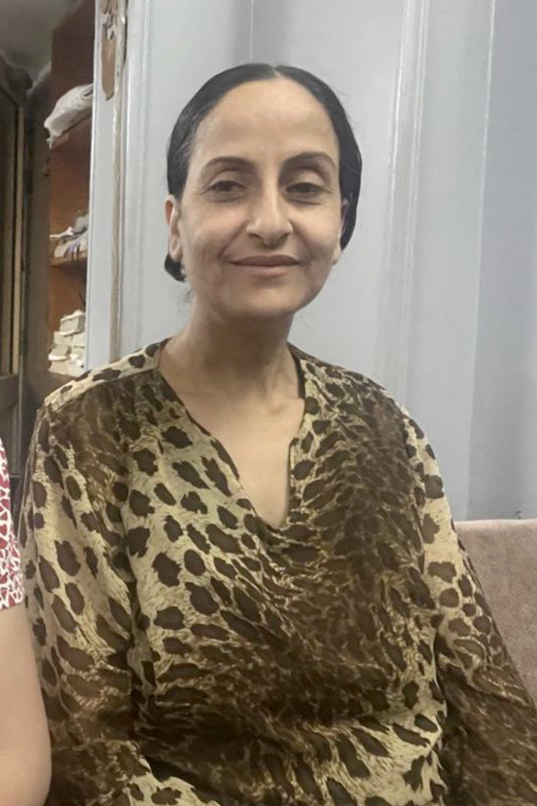 Practical tools for managing emotions help Um Mehraeil to reconnect with her children.
